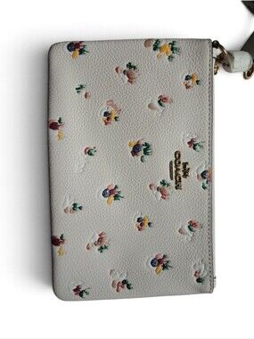 COACH Pebbled Leather Floral Wristlet with Gold Logo